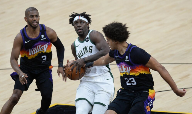  霍勒迪防守建功雄鹿主场险胜热火  